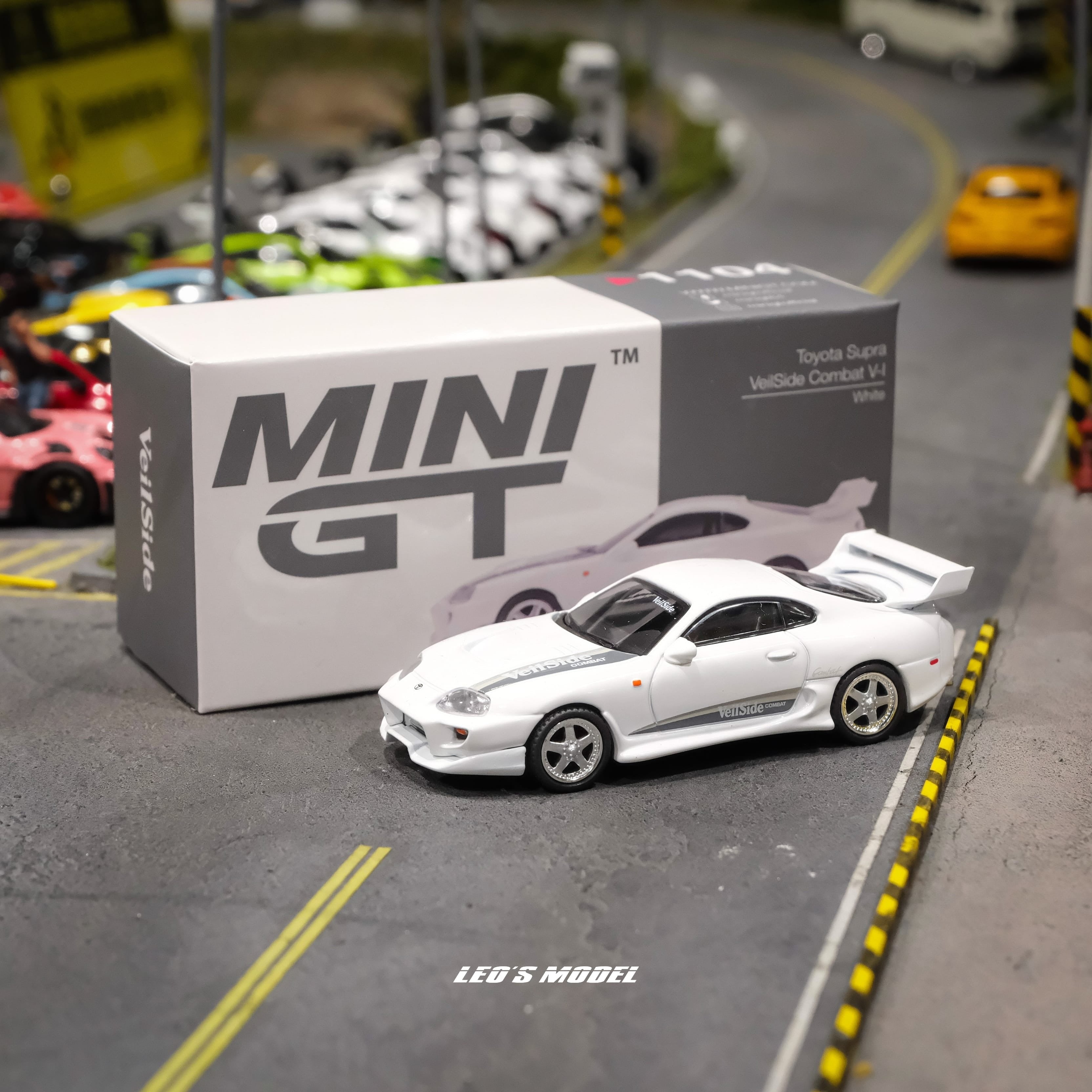 Mini GT Imported Toyota Supra VeilSide Combat V-I White 1:64 Diecast Model Car 1104