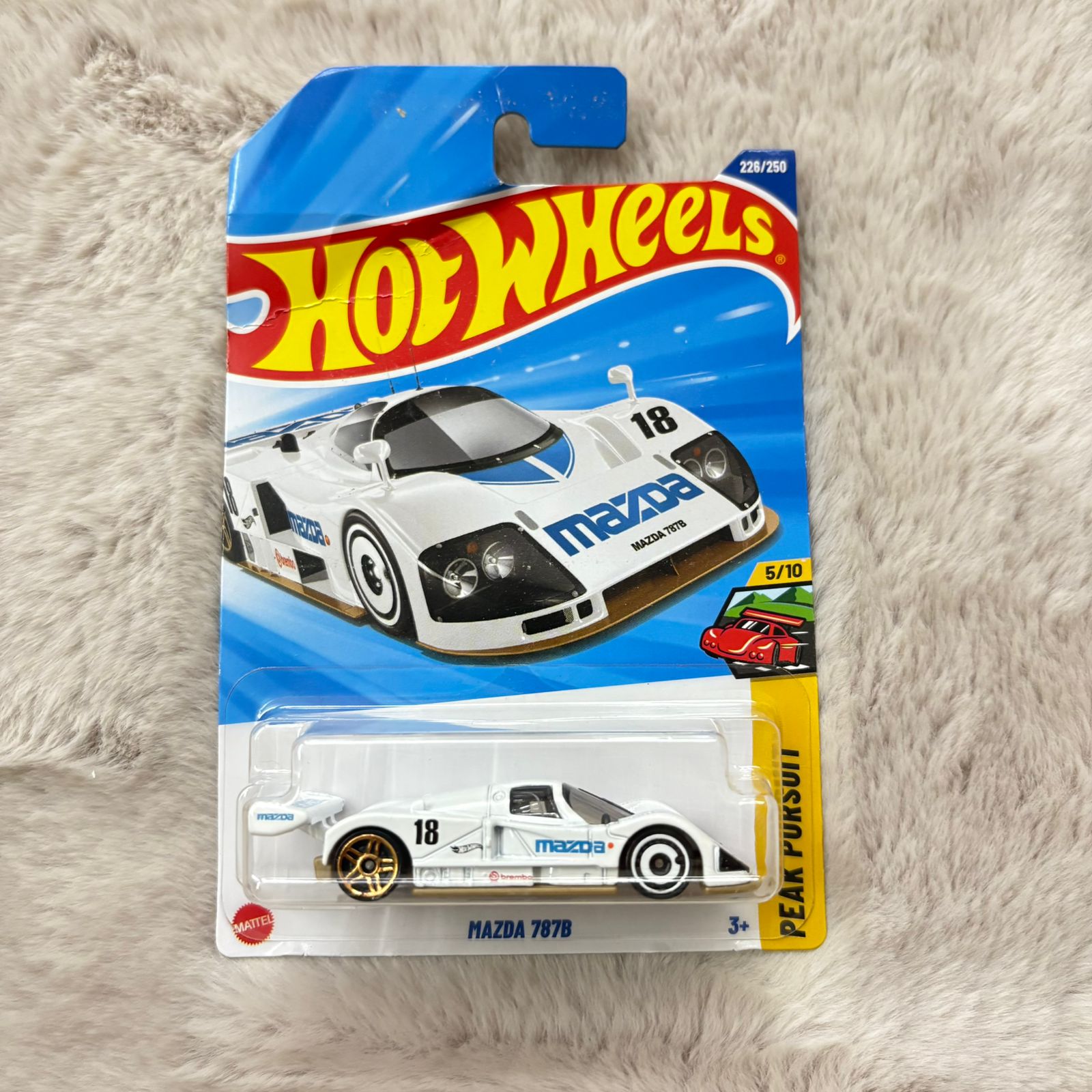 Hot Wheels 2025 L and M Case Vehicle Exclusive Collection - Mazda 787B - Card Damaged - Car In Mint Condition