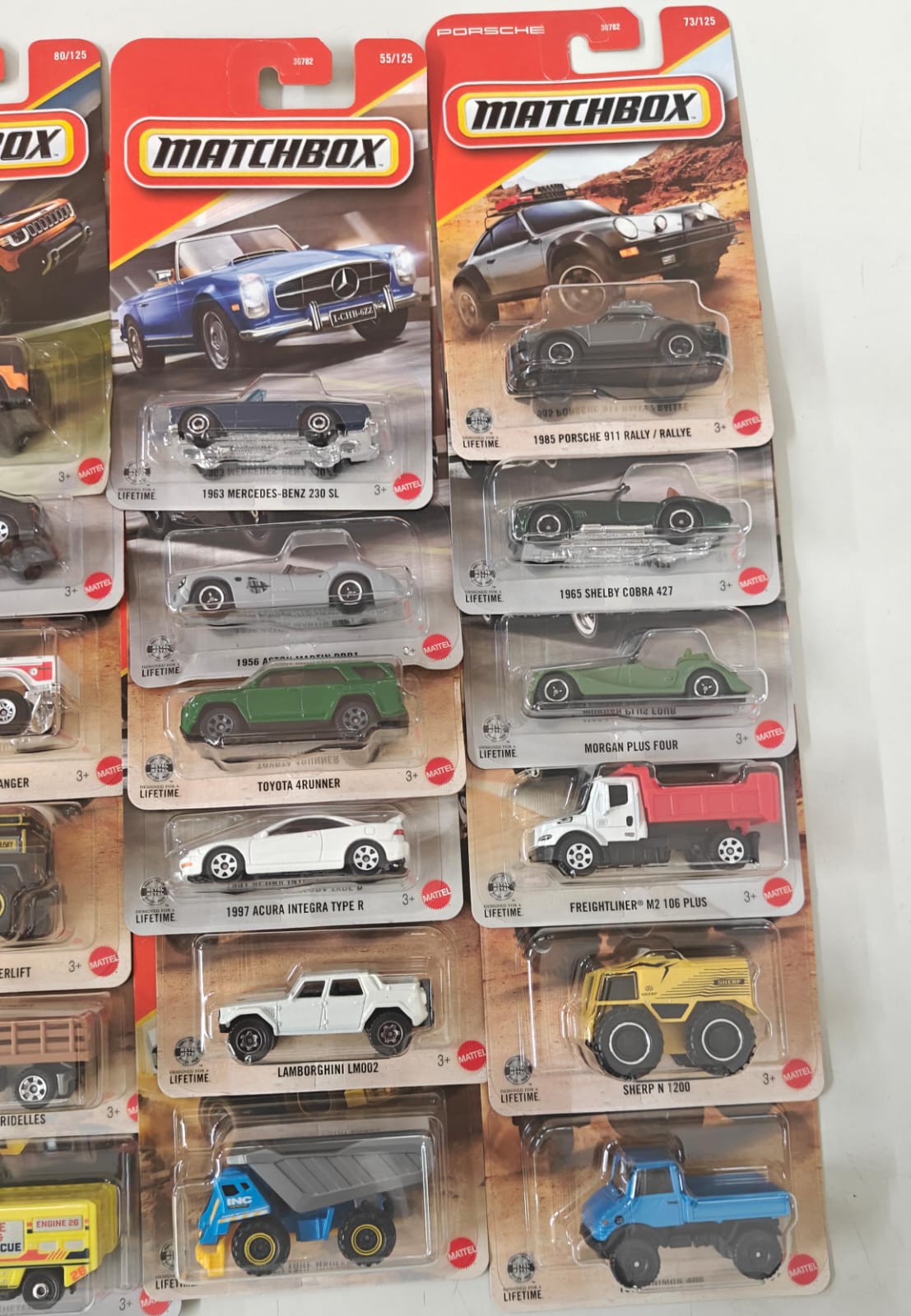 Matchbox Scale 1 : 64 Vehicles Exclusive Collection - Set of 24 cars + 2 Random Hot Wheels
