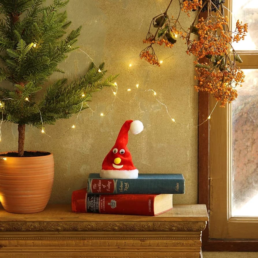 Decorative Moving Santa Cap ShowPiece With Sound - Battery Operated