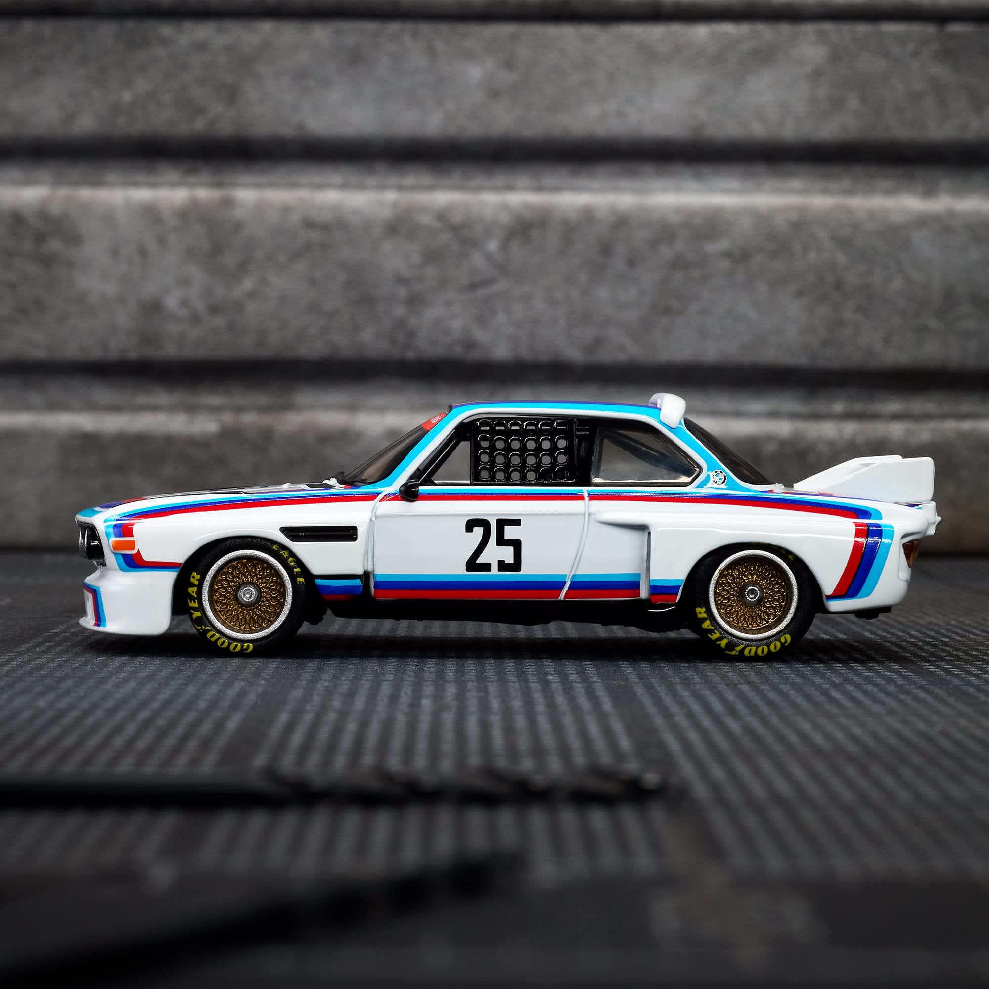 Hot Wheels Scale 1:64 Imported Elite 64 1975 BMW 3.0 CSL Race Vehicle Exclusive Collection
