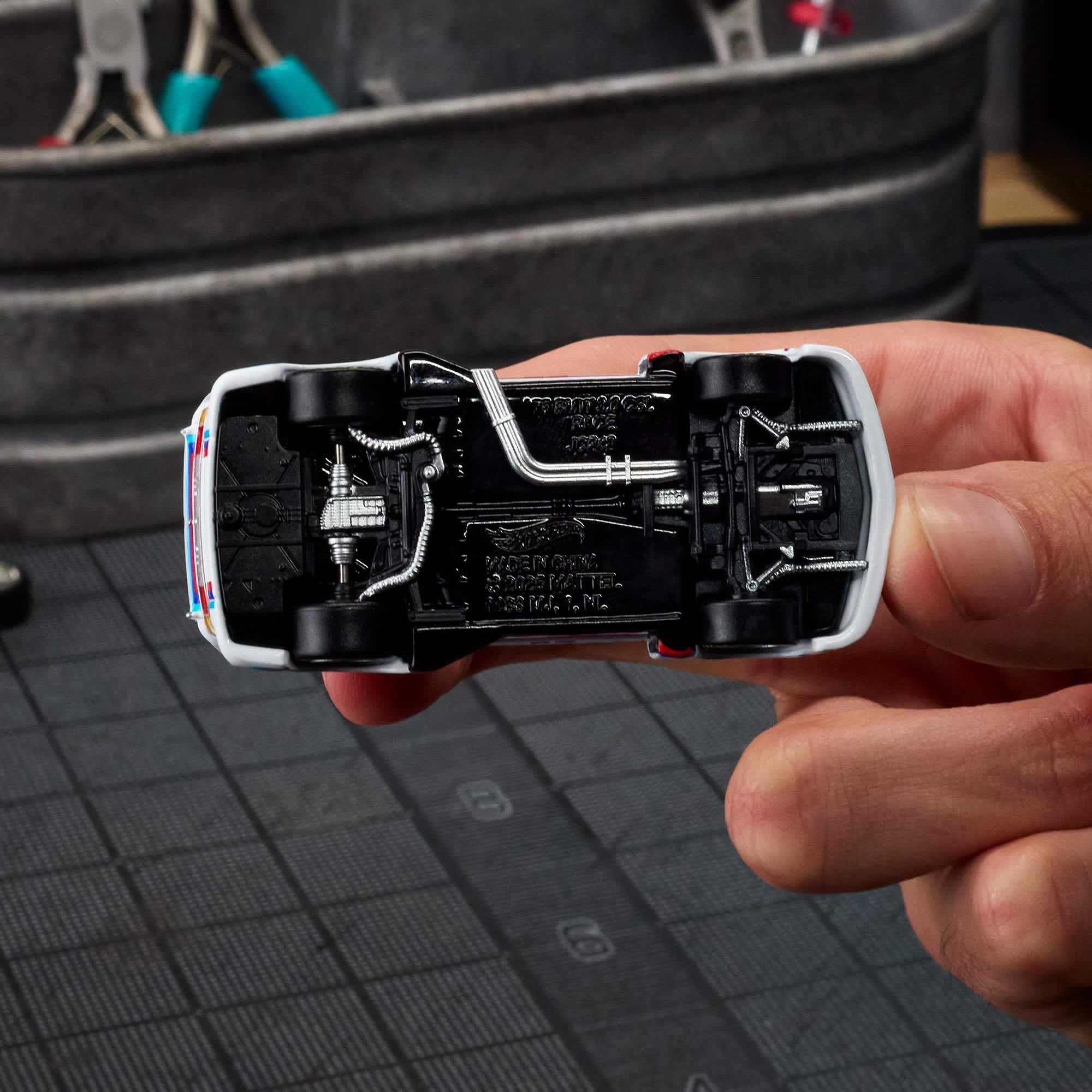 Hot Wheels Scale 1:64 Imported Elite 64 1975 BMW 3.0 CSL Race Vehicle Exclusive Collection