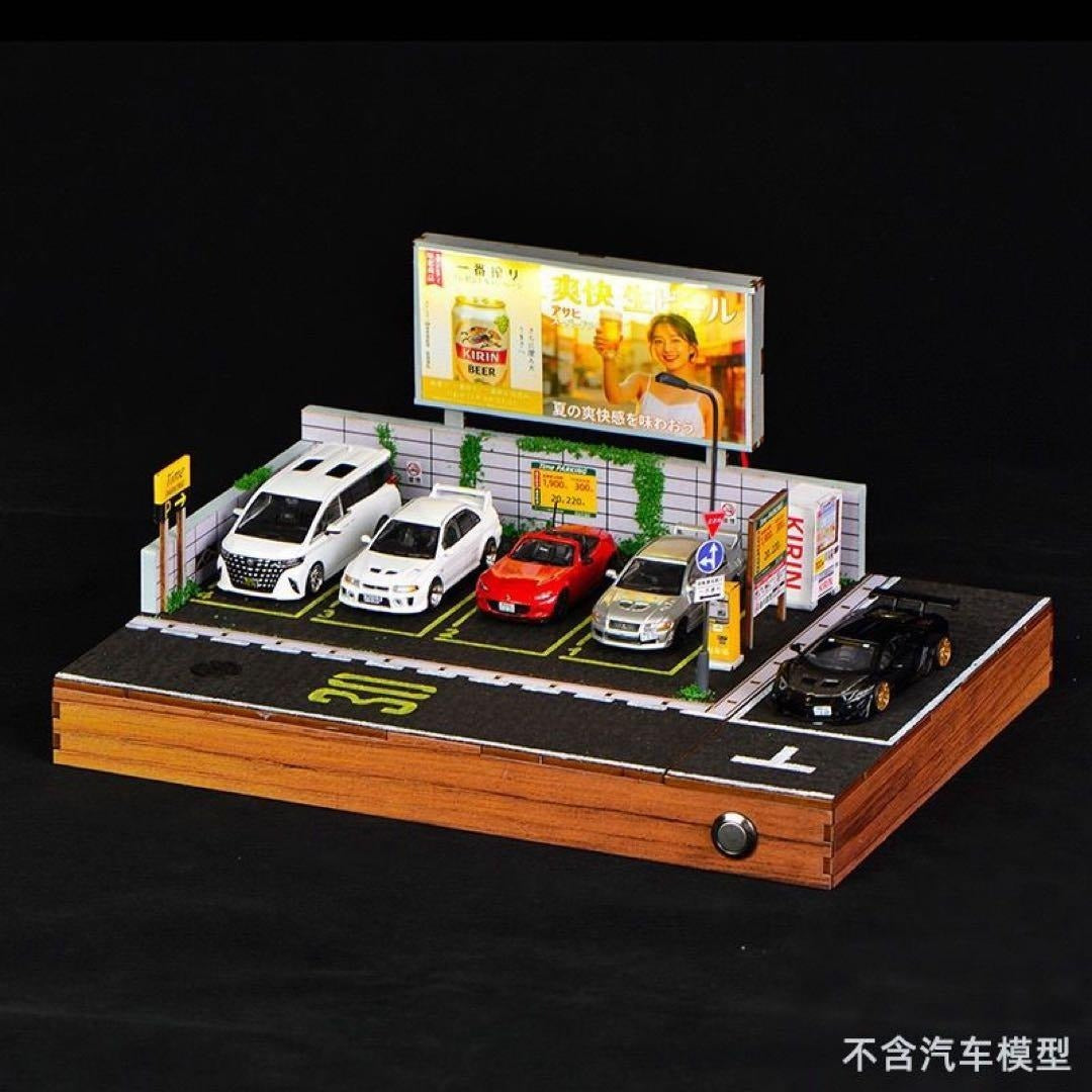Japanese Parking Lot LED Diorama with Kirin Beer Billboard with diecast cars for scale on black background
