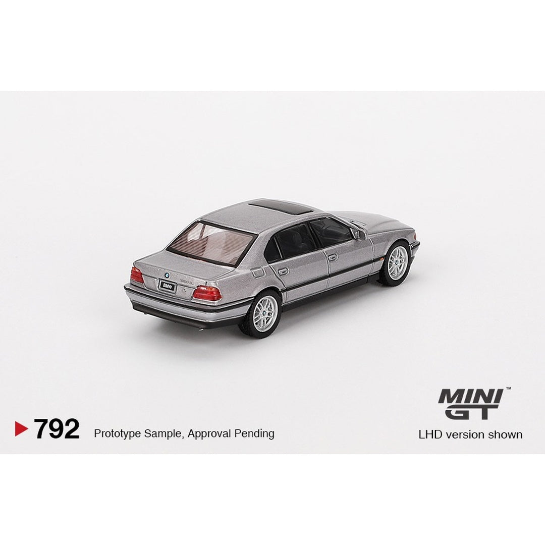 Mini GT #792 BMW 750iL Aspen Silver Metallic 1:64 diecast model car - rear three-quarter view