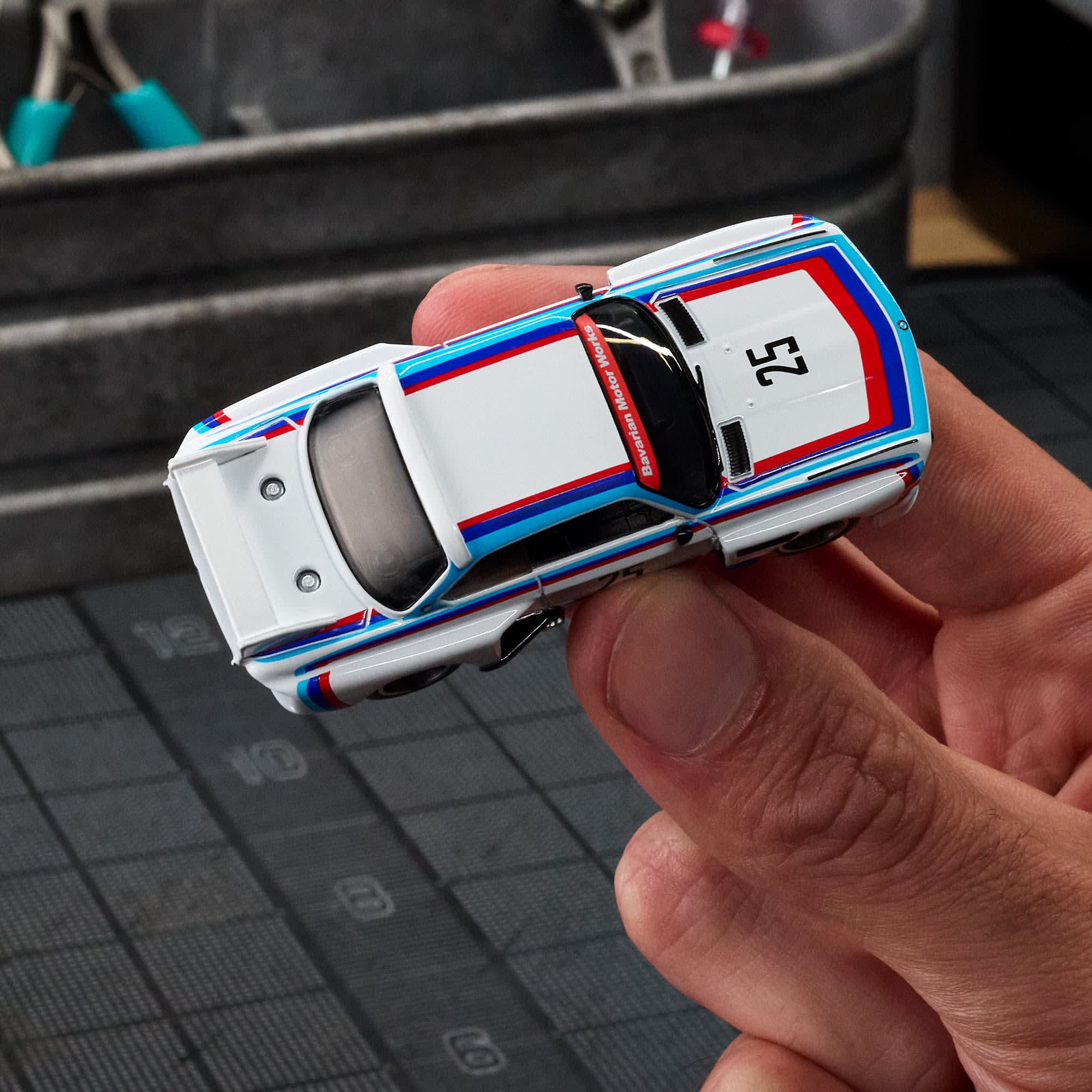 Hot Wheels Scale 1:64 Imported Elite 64 1975 BMW 3.0 CSL Race Vehicle Exclusive Collection