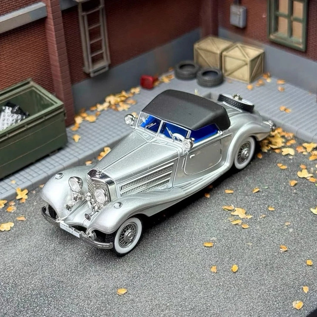 Liberty 64 1936 Mercedes-Benz 500 K Spezial Roadster diecast model car silver, soft top raised, diorama scene