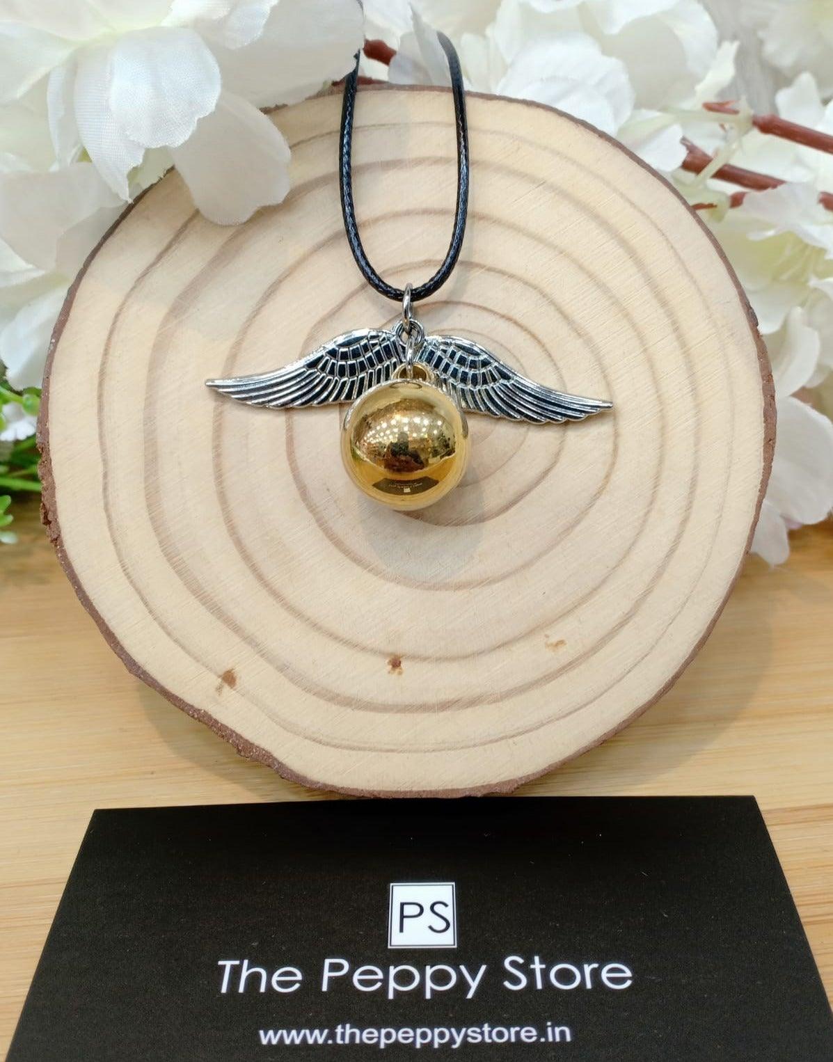 Golden snitch locket on sale necklace