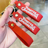 Pirates Of The Carribean Silicon Keychain With Bagcharm and Strap (Select From Drop Down Menu) - ThePeppyStore