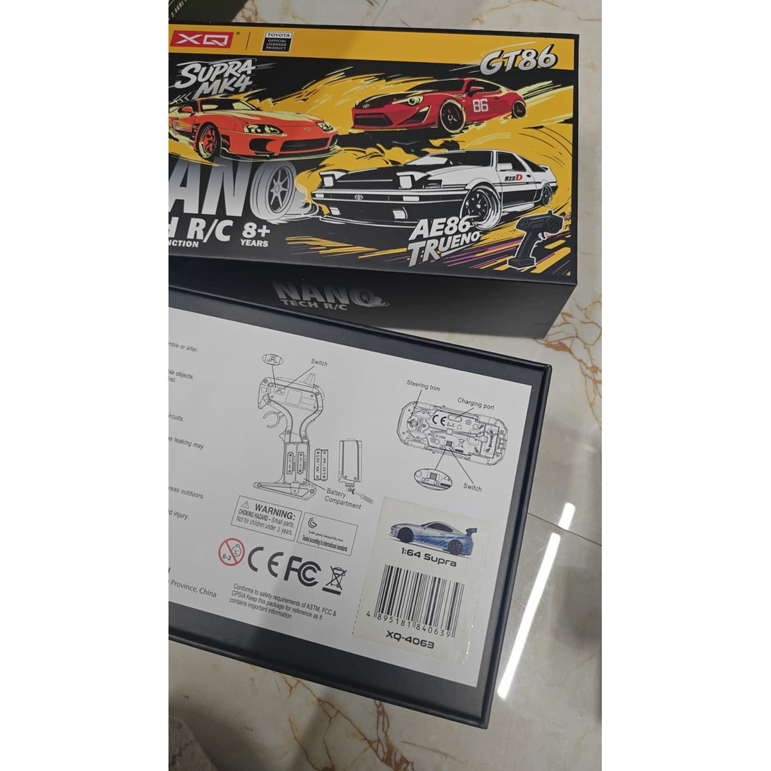 Toyota Supra MK4 Style Remote Control Drift Car with LED Headlights, Wireless Remote, Rechargeable Battery, Racing Cones & USB Charging Cable – Silver & Blue 1:64 Scale