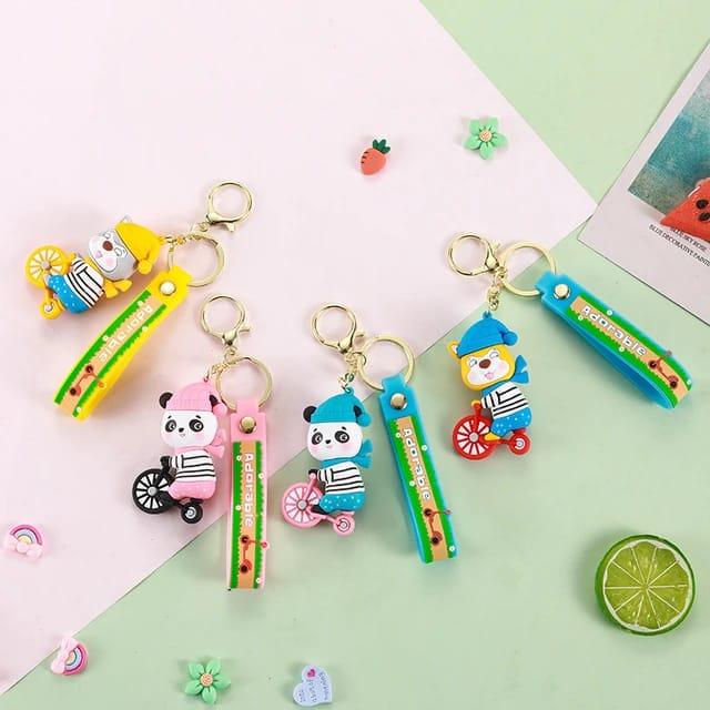 Dog On Bicycle Silicon Keychain With Bagcharm (Select From Drop Down) - ThePeppyStore