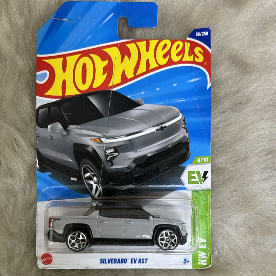 Hot Wheels Imported Vehicle Collection -  Silverado EV RST - Card Damaged - Broken Blister - Car In Mint Condition