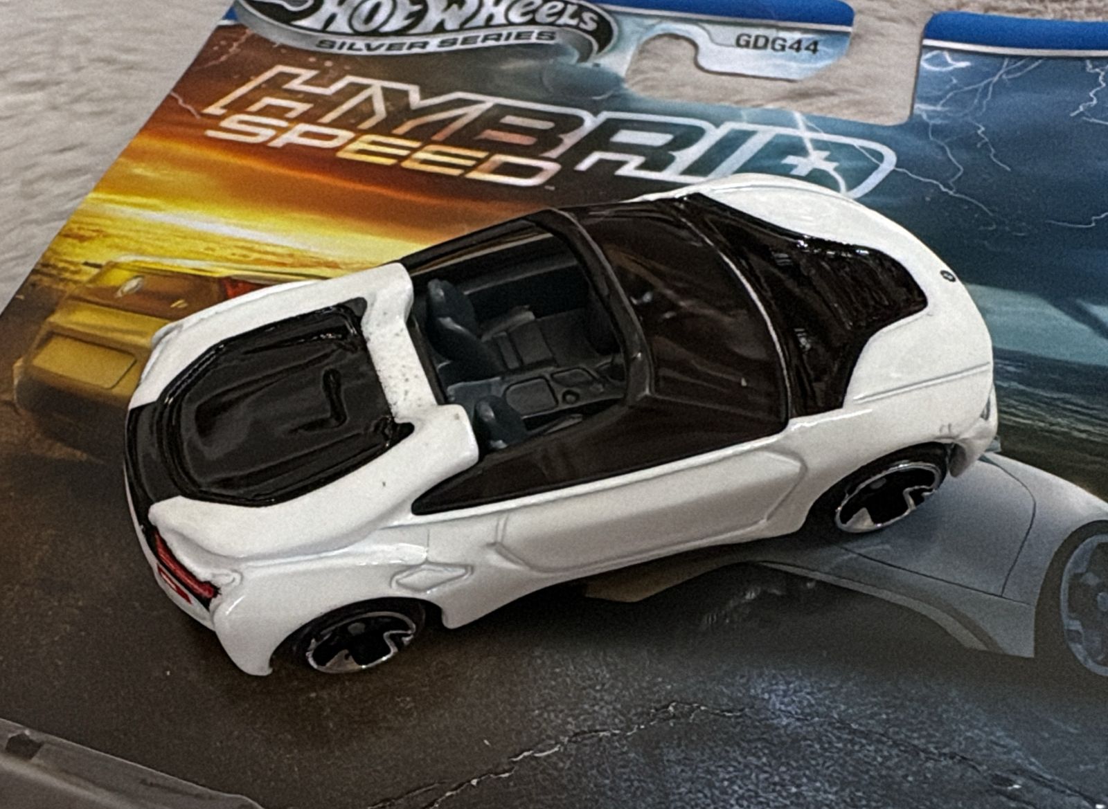 Hot Wheels Scale 1:64 Imported 2025 Silver Series Hybrid Speed Series - BMW i8 Roadster - Card damaged Blister Broken Car In Mint Condition