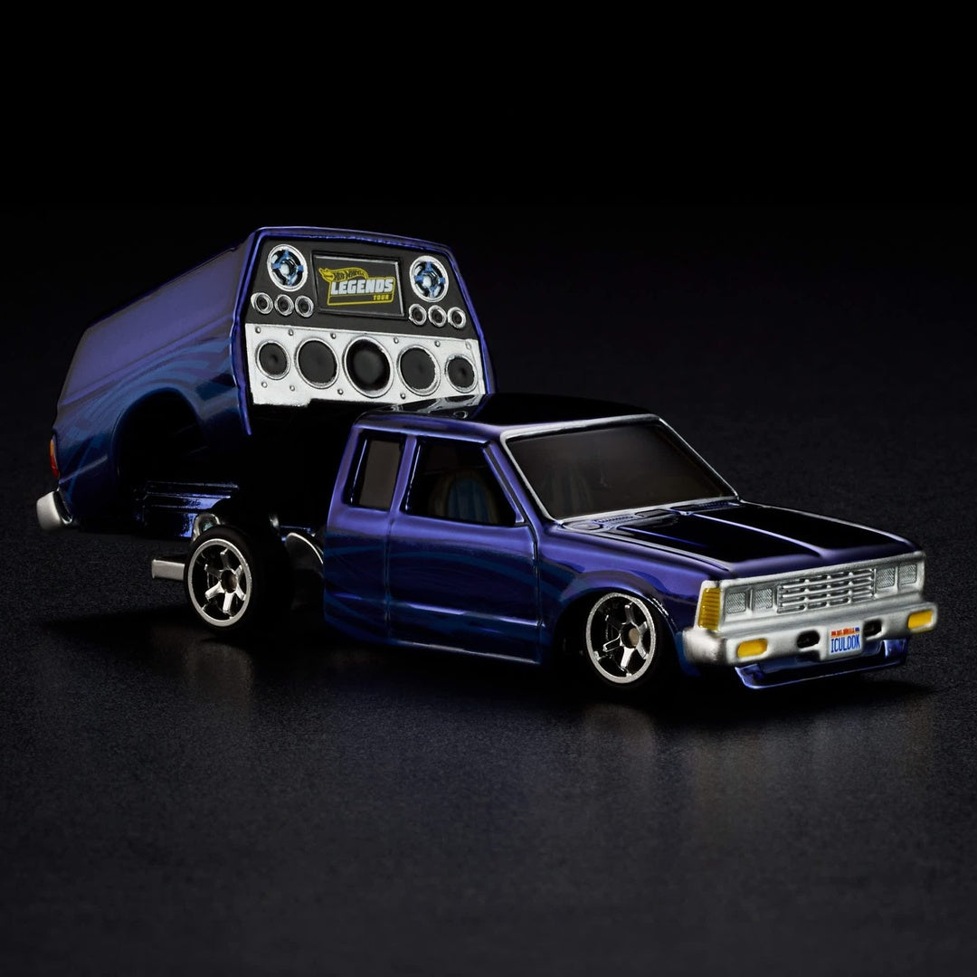 Hot Wheels RLC Legends Tour 1986 Nissan 720 King Cab 1:64 Diecast Model Car - Rear Angle with Hatch Open Showing Legends Tour Speaker Panel