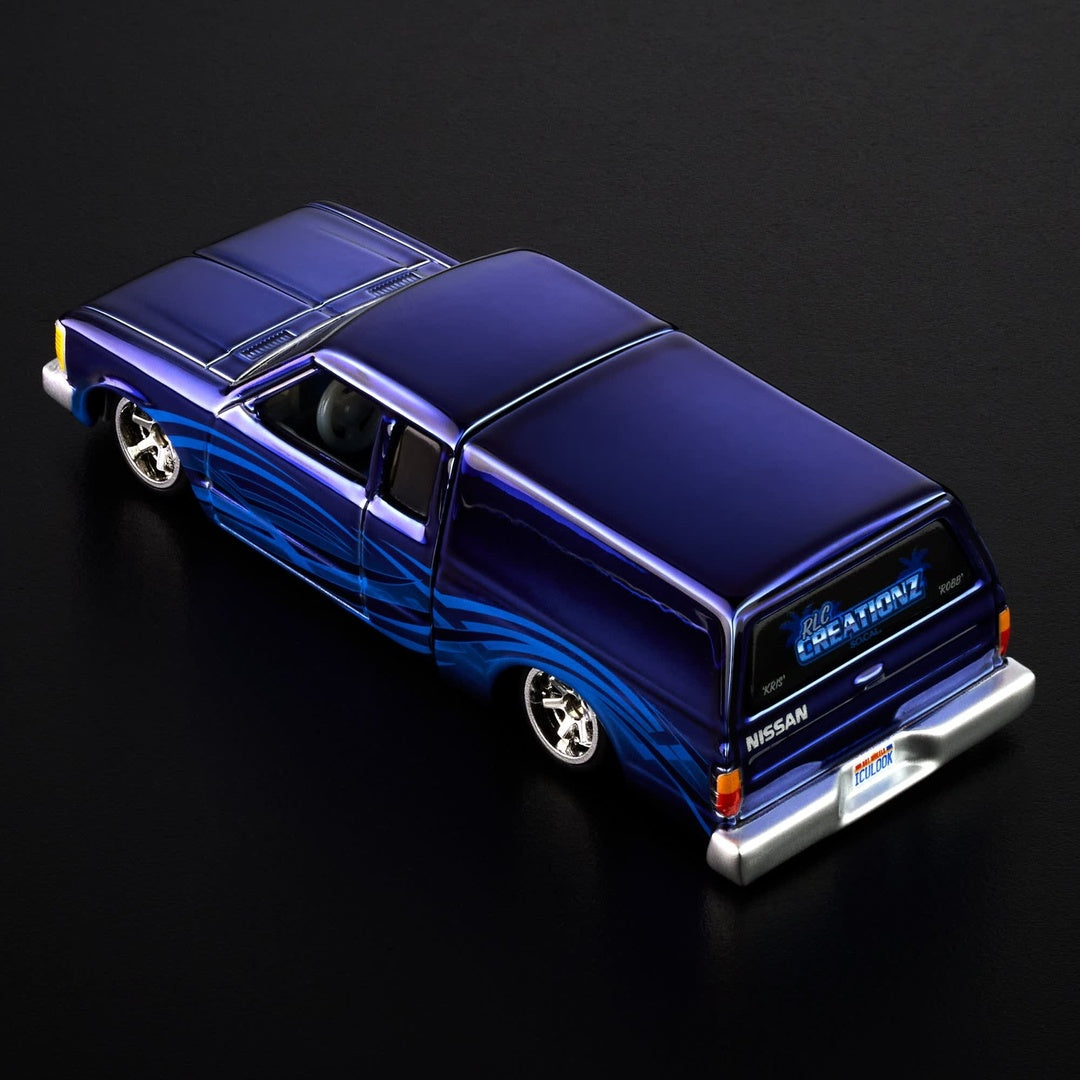 Hot Wheels 1986 Nissan 720 King Cab 1:64 Diecast Model Car - Rear Three-Quarter View
