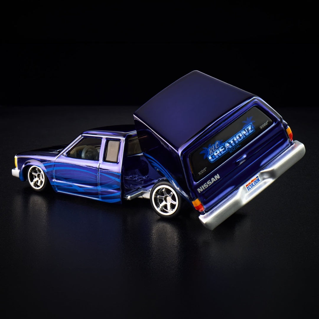 Hot Wheels RLC 1986 Nissan 720 King Cab 1:64 Diecast Model Car - Rear Angle with Hatch Open Showing RLC Creationz Decal